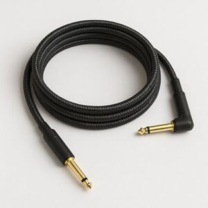 Studio-style photo of a premium braided guitar cable with one straight plug and one right-angle plug, gold-plated connectors, neatly coiled on a clean white background with soft shadows.