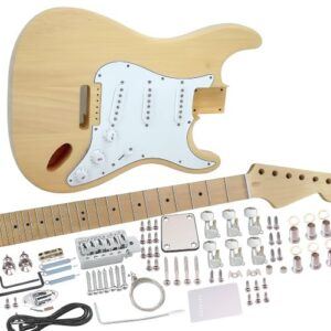 Overhead photo of an unassembled Strat-style electric guitar kit with a natural wood body, maple neck, white pickguard, single-coil pickups, chrome hardware, screws, strings, and wiring components arranged neatly on a white background.
