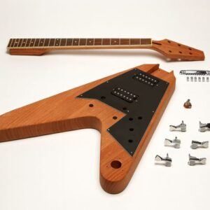 Unassembled V-style electric guitar kit with natural wood body, bolt-on neck, black pickguard, humbucker pickups, and chrome hardware laid out on a white background.