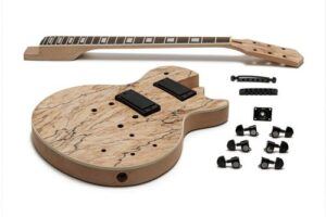 Unfinished LP-style DIY guitar kit with a spalted maple body, detached neck, and black hardware components neatly arranged on a white background.